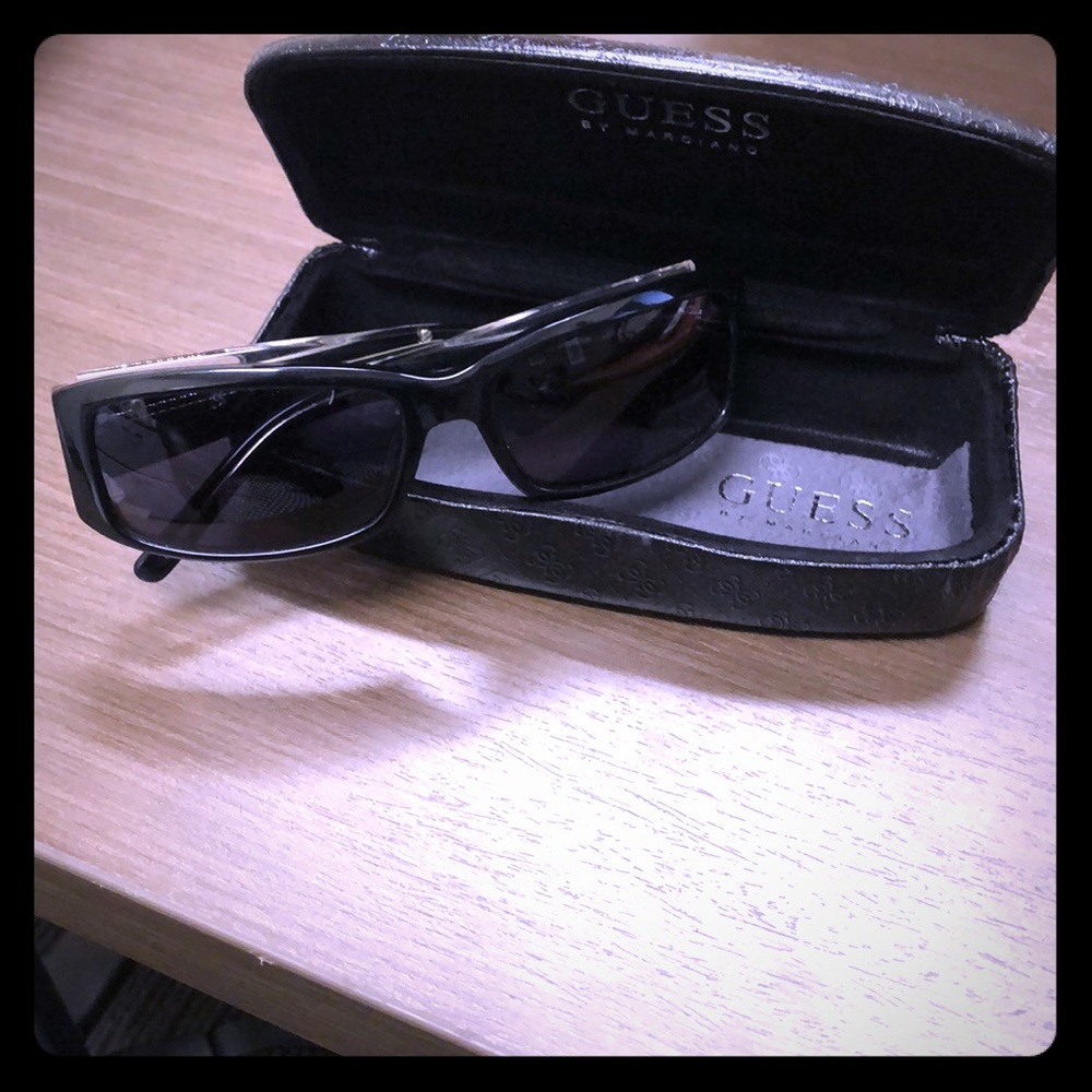 Guess by Marciano sunglasses with case and cloth.